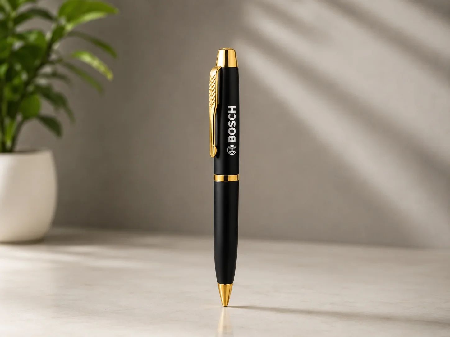 Satin Black Metal Ballpoint Pen with Feather Motif Gold Clip